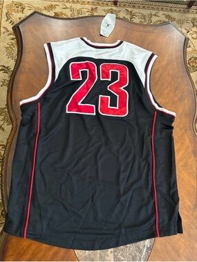 Vintage 2003 Air Jordan Black and red basketball jersey 23 on the back size Larg